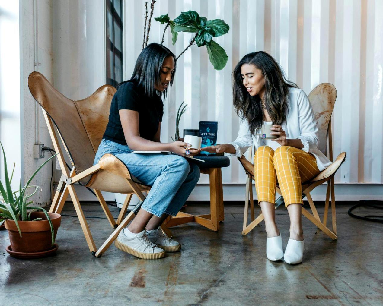 Small business owner reviewing financial documents and planning business growth strategies