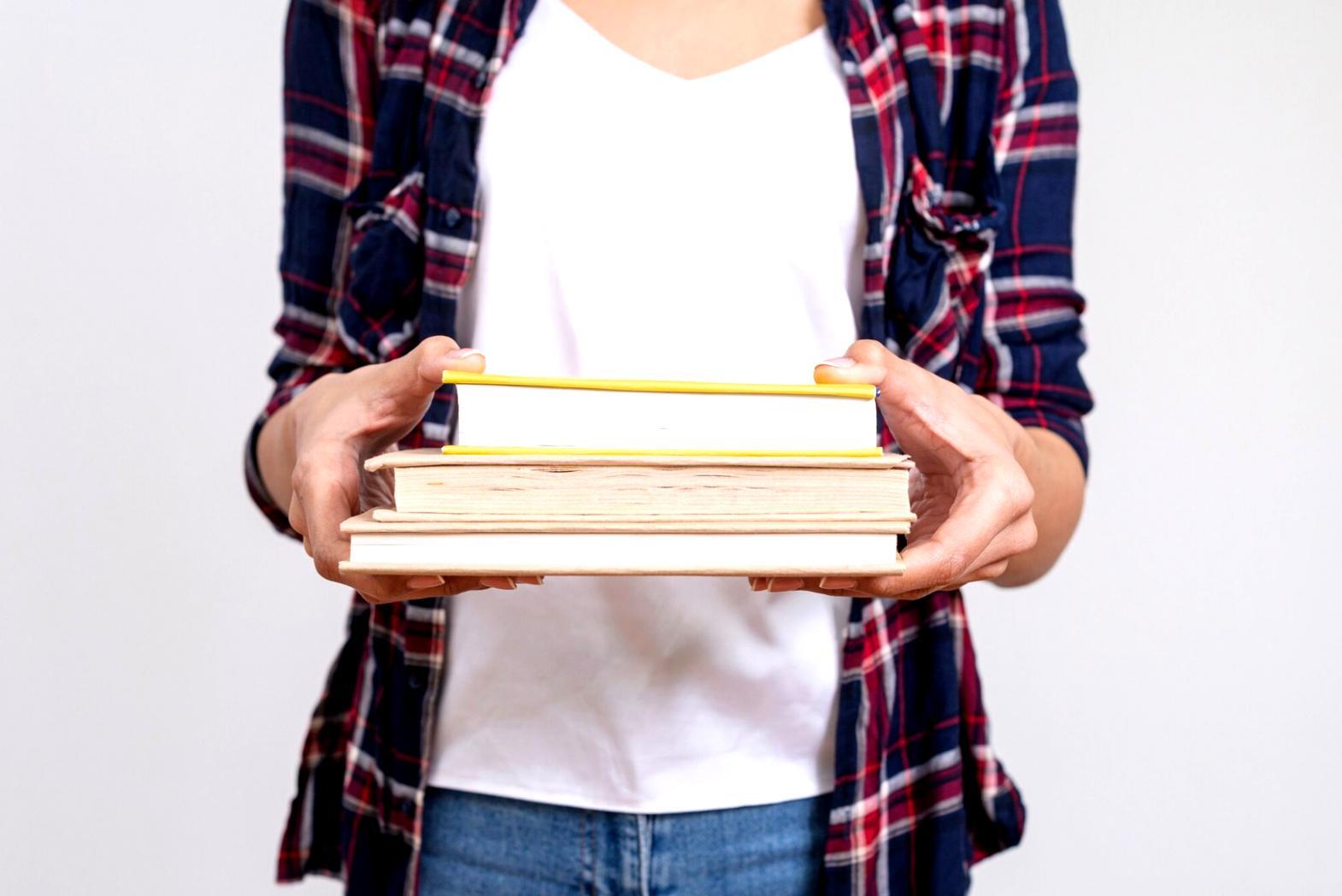 Business owner analyzing financial reports and performance metrics on laptop